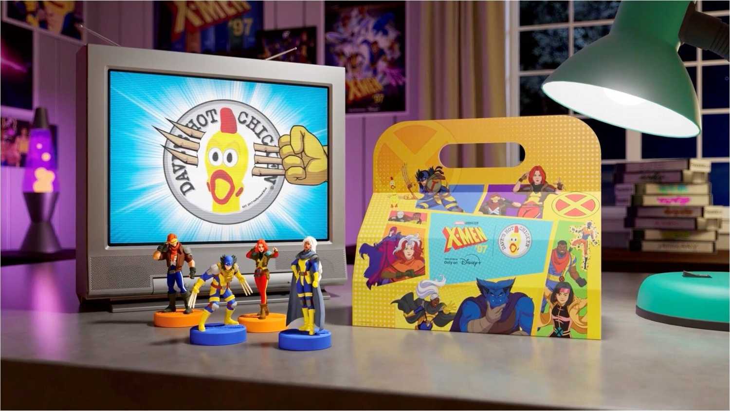 Four X-Men character figurines are displayed on a tabletop in front of a retro television showing the Dave's Hot Chicken logo. An X-Men '97-themed meal box featuring comic-style artwork sits beside the figures. The scene is styled like a nostalgic fan room with colorful lighting, posters, books, and a desk lamp in the background.